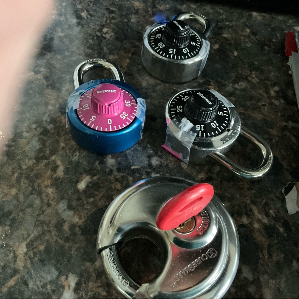 Padlocks, with combinations taped on back or included key